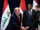 US-Präsident Donald Trump schüttelt dem syrischen Präsidenten und früheren al-Kaida-Mann Ahmed al-Sharaa die Hand, während der Emir von Katar, Scheich Tamim bin Hamad al-Thani, zusieht. (Foto: Brendan SMIALOWSKI / AFP)